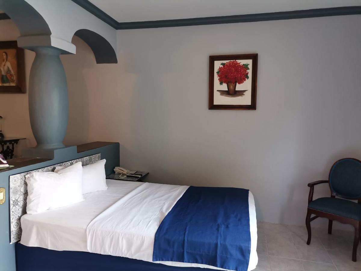 Gran Hotel Hacienda De La Noria Aguascalientes Bagian luar foto A room at the hotel